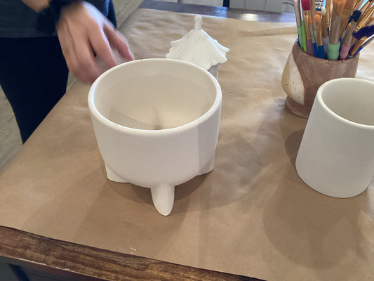 Modern footed container